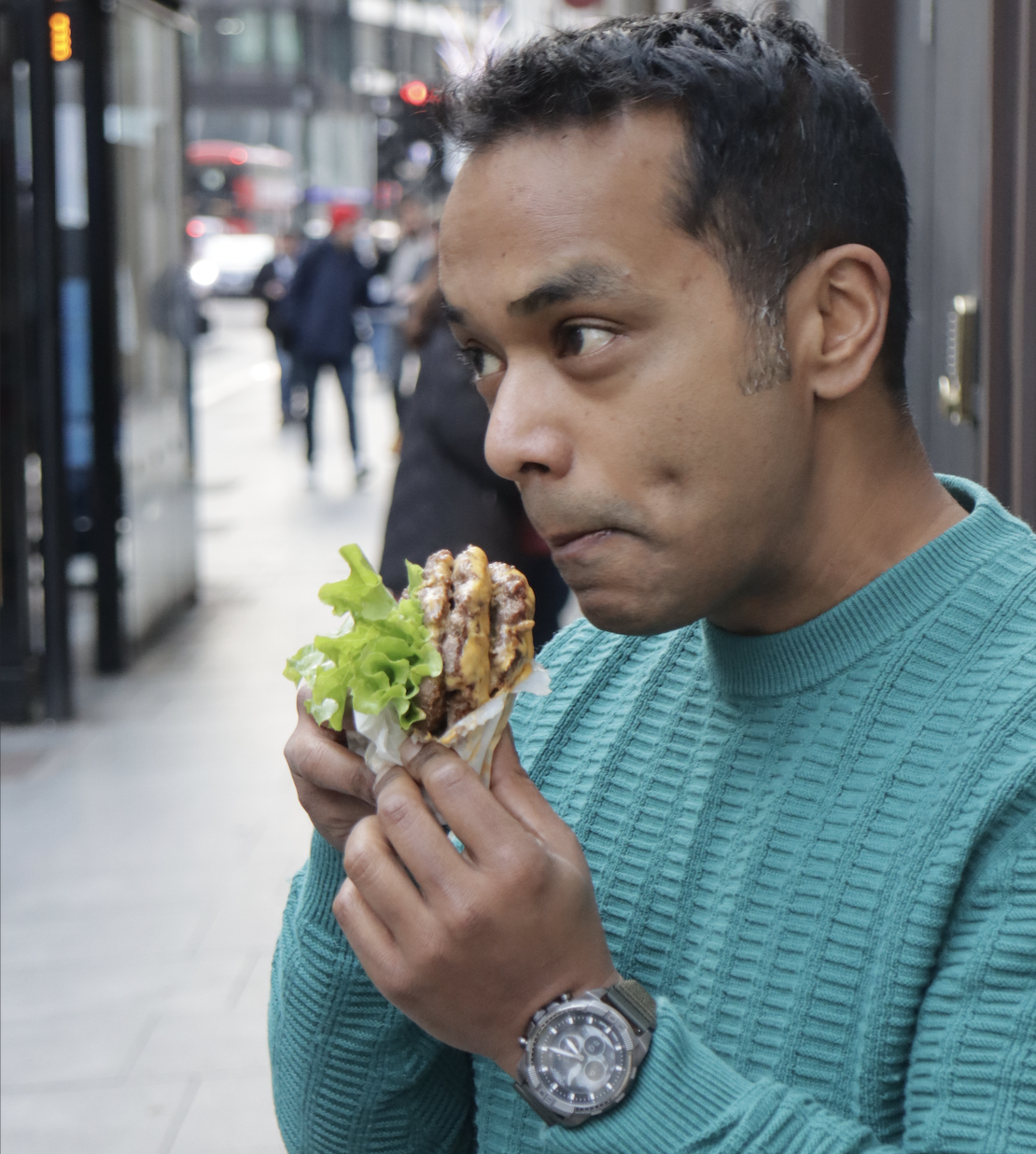 Liton eating a burger